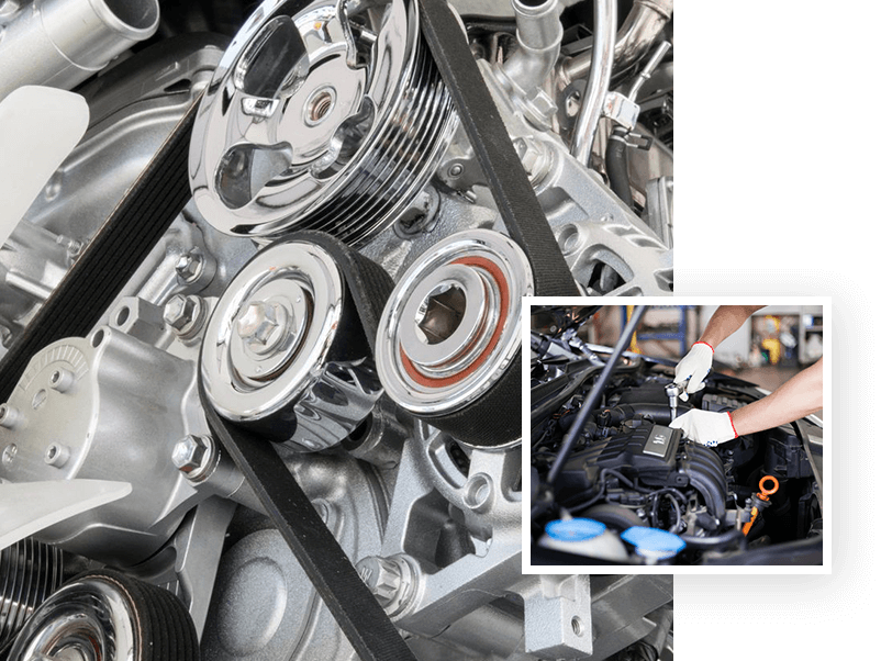 A car engine with the belt and timing chain being worked on.